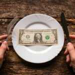 dollar bill on plate