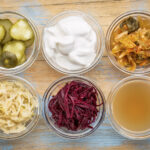 glass bowls containing fermented foods