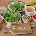 Fiber-rich foods on wooden table