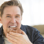 Man eating a doughnut