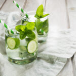 glasses of water with cucumber and mint