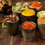 small pots of colorful spices