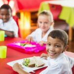 Children eating together at school