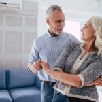 Couple dancing at home