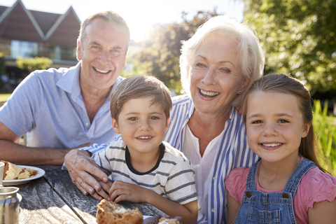 Grandparents enjoying the outdoors with their grandchildren